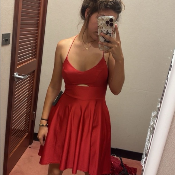 Vibrant Red Homecoming dress. Size 1. brand is City Vibe. Bought from Dillards. Vibrant Red Homecoming dress. Size 1. brand is City Vibe. Bought from Dillards.